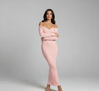 Woman wearing a pink off-shoulder dress against a gray background